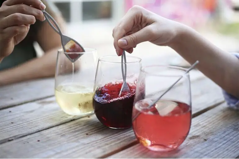 wine filled glasses using The Wand by PureWine to have wine without migraine