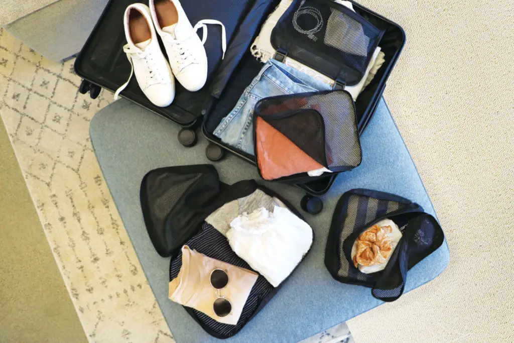 luggage set out to be packed traveling with migraine
