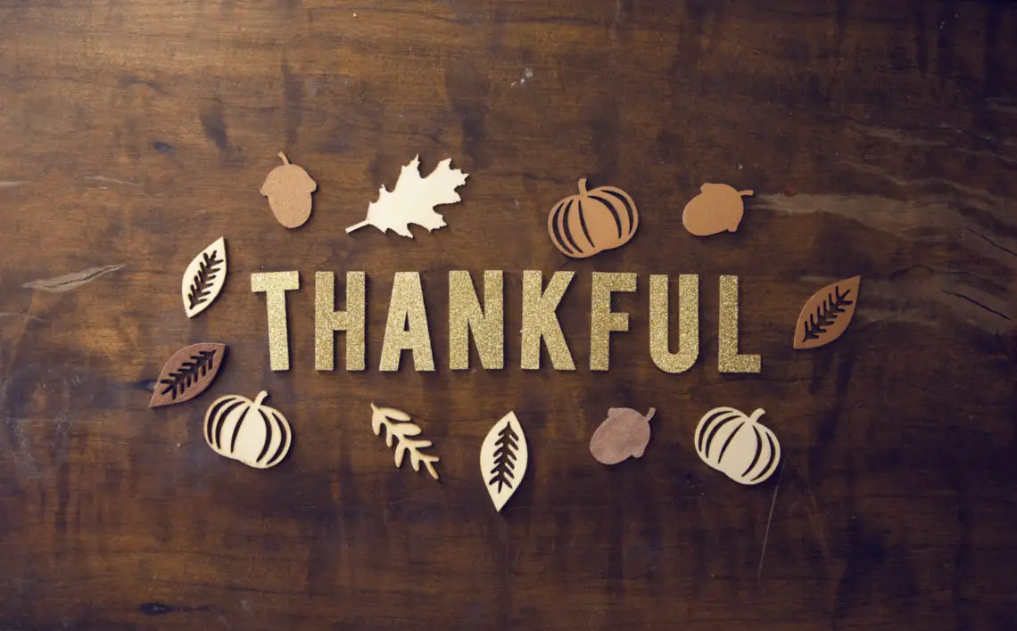 block letters spell our thankful reminding us to practice gratitude